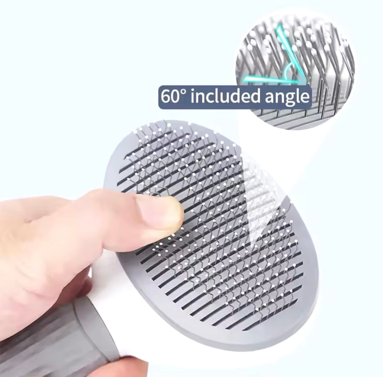 Brosse pour animaux de compagnie en acier inoxydable.